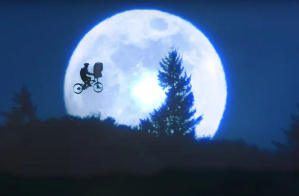 Imagem inspirada em E.T. – O Extraterrestre, filme clássico de Steven Spielberg citado no artigo sobre Dia D e a nostalgia da ficção científica.