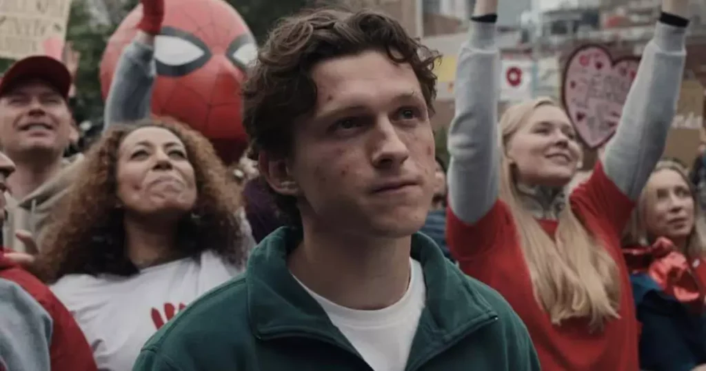 Peter Parker e Homem-Aranha na cena final de Homem-Aranha: Um Novo Dia